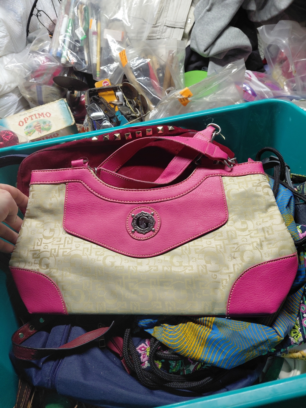 shoulder bag by G by Guess, featuring a beige and white logo pattern